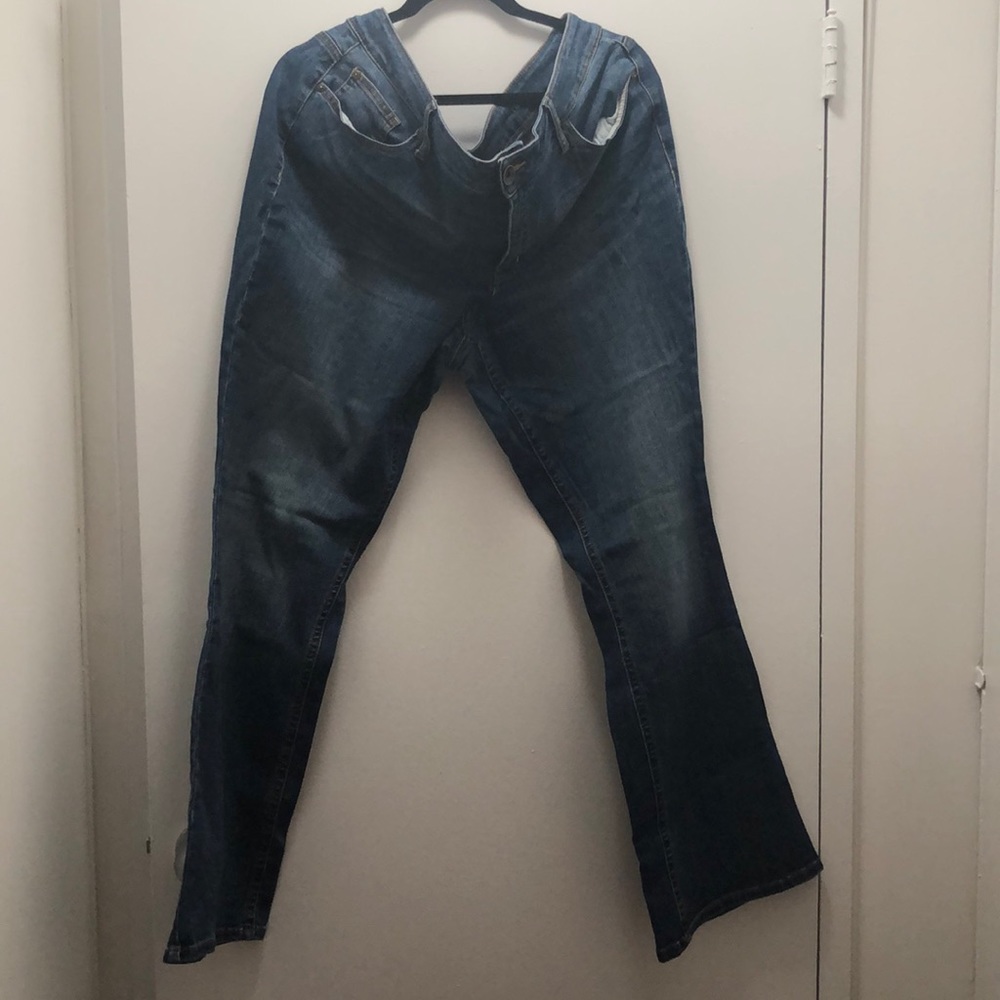 Boot cut jeans. Super comfortable and flattering.